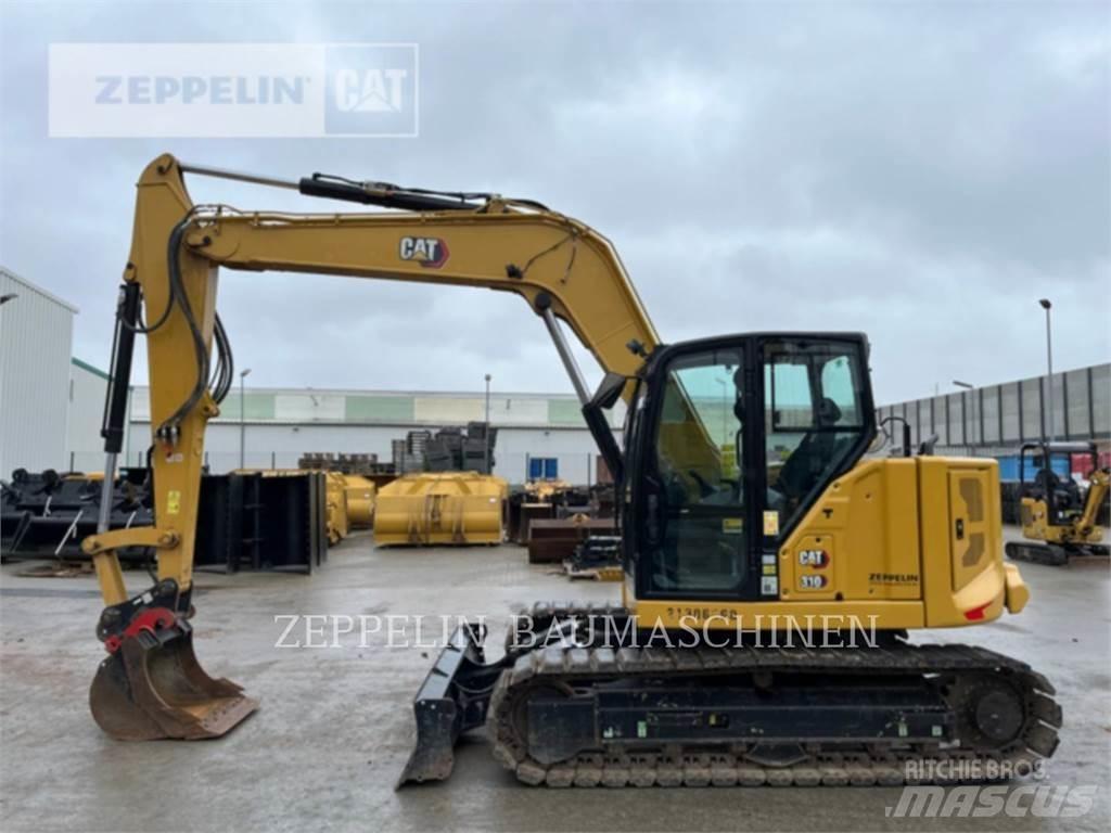 CAT 310 Pásová rýpadla