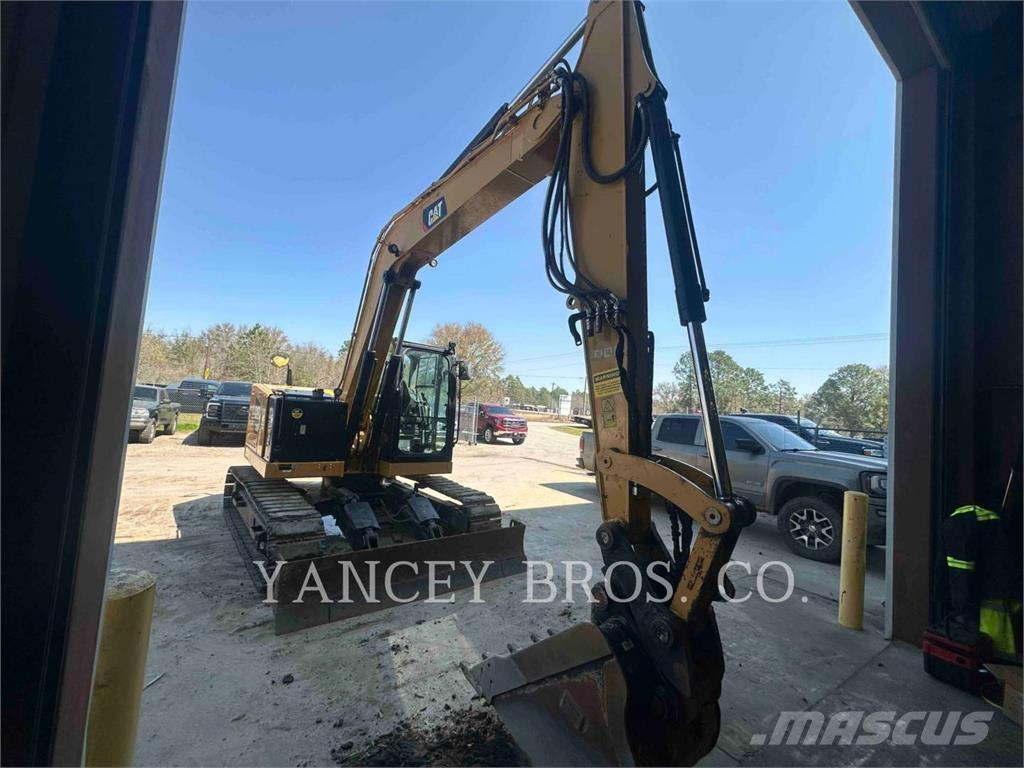 CAT 310 Pásová rýpadla