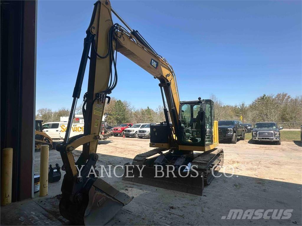 CAT 310 Pásová rýpadla