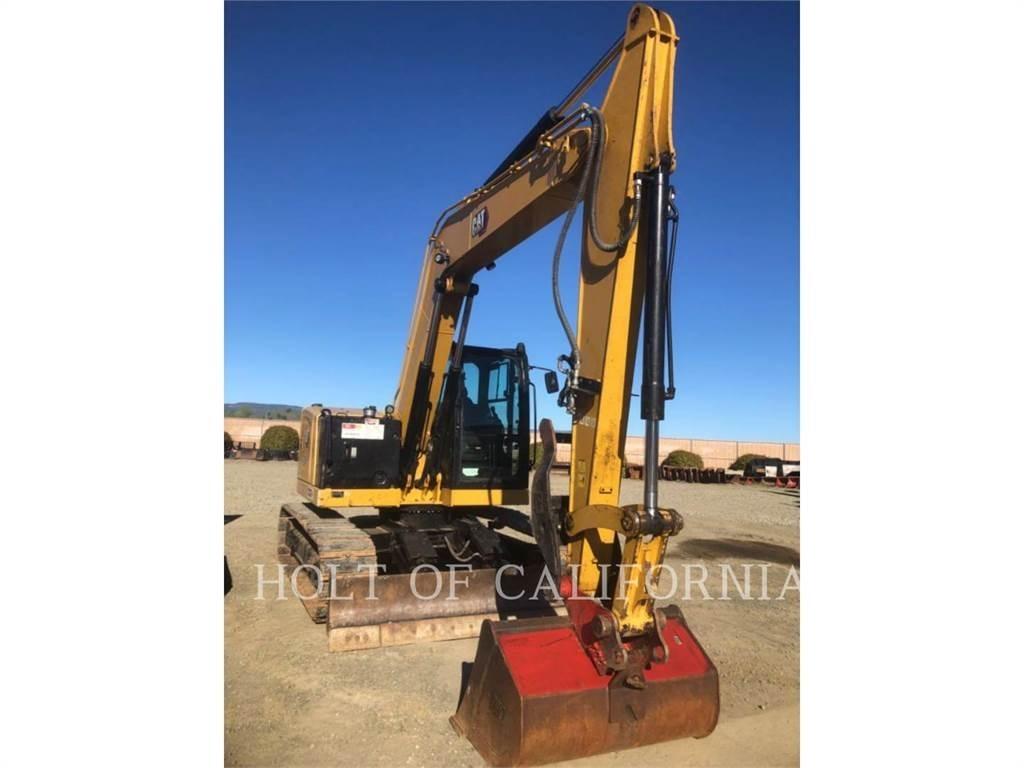 CAT 310 Pásová rýpadla