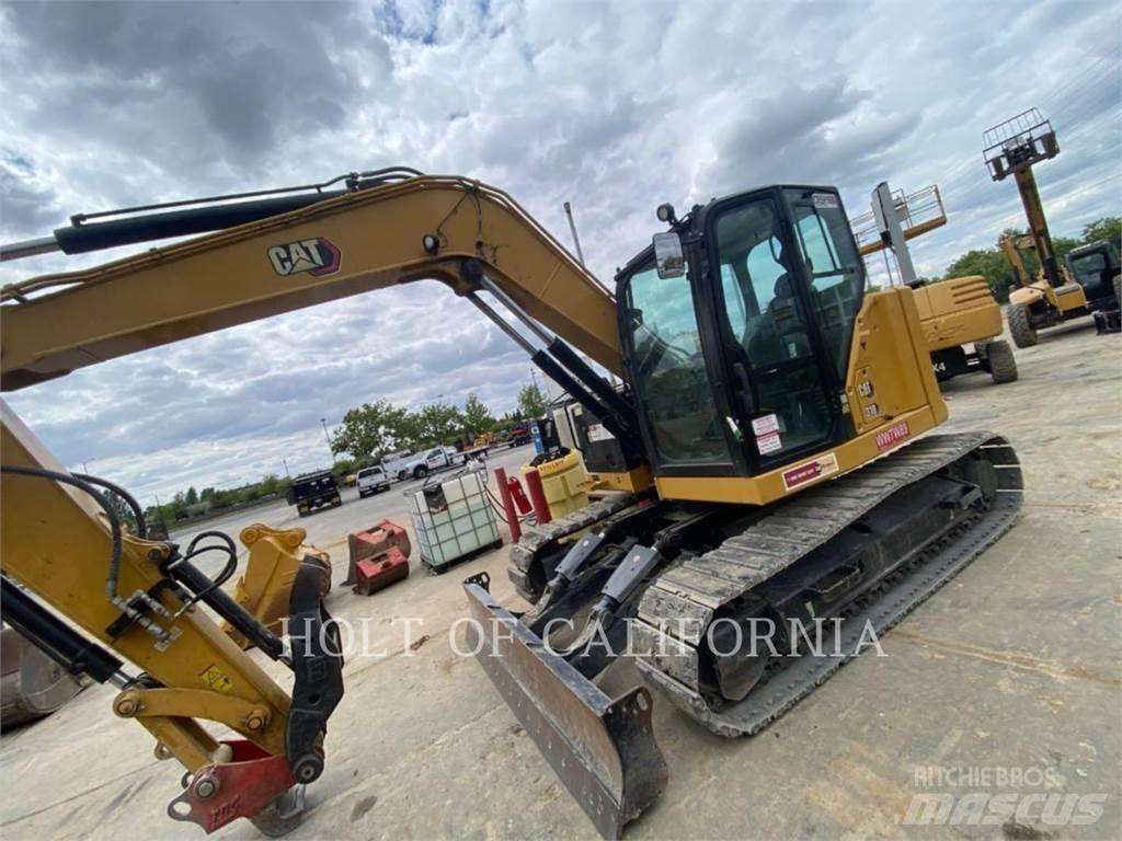 CAT 310 Pásová rýpadla