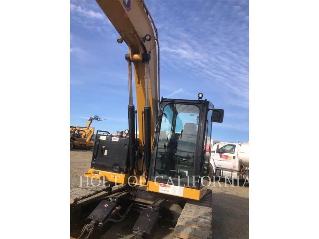 CAT 310 Pásová rýpadla