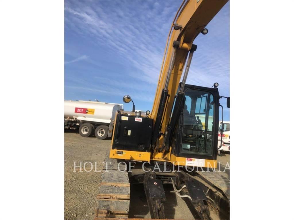 CAT 310 Pásová rýpadla