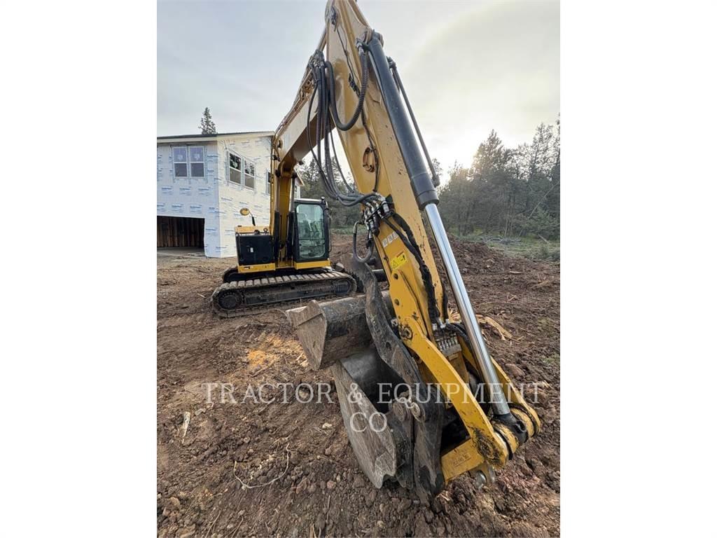 CAT 310 Pásová rýpadla