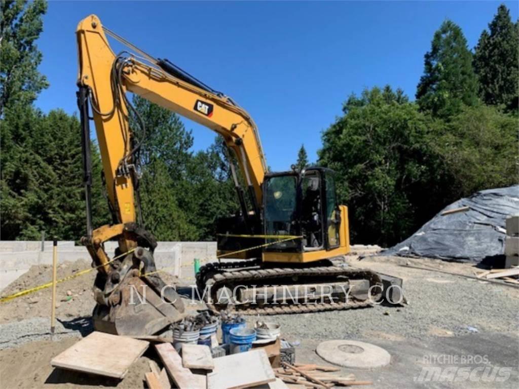 CAT 310 Pásová rýpadla