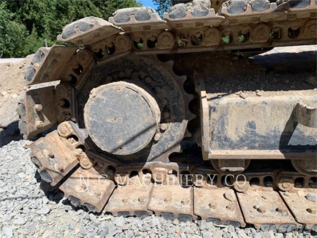 CAT 310 Pásová rýpadla