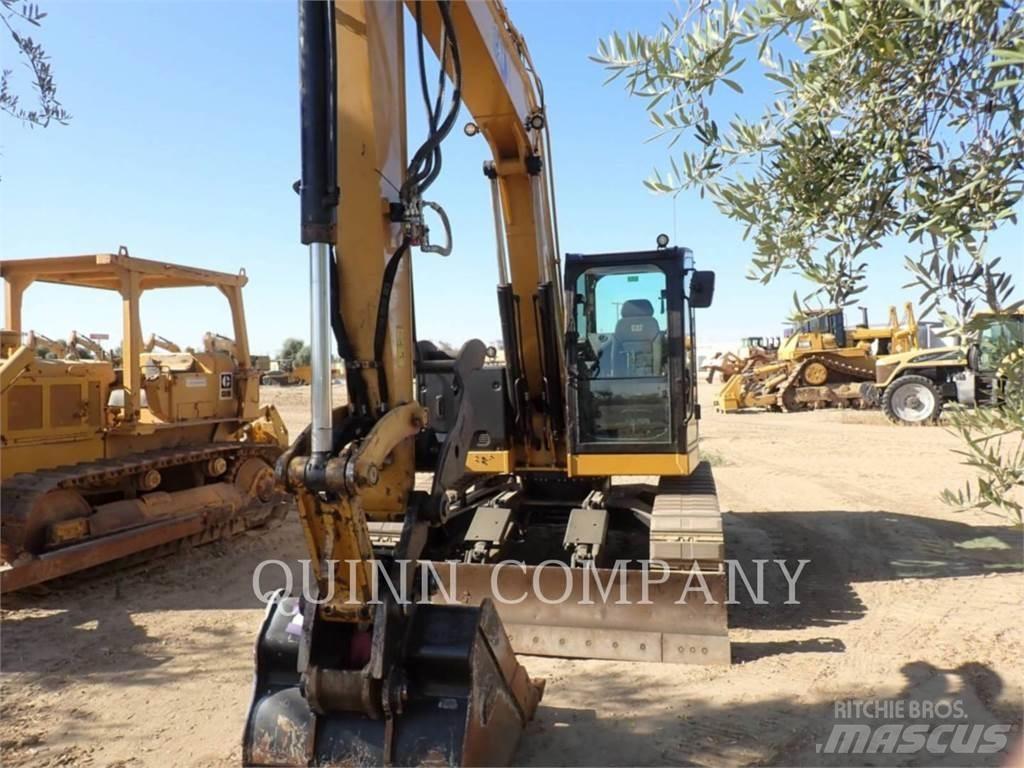 CAT 310 Pásová rýpadla