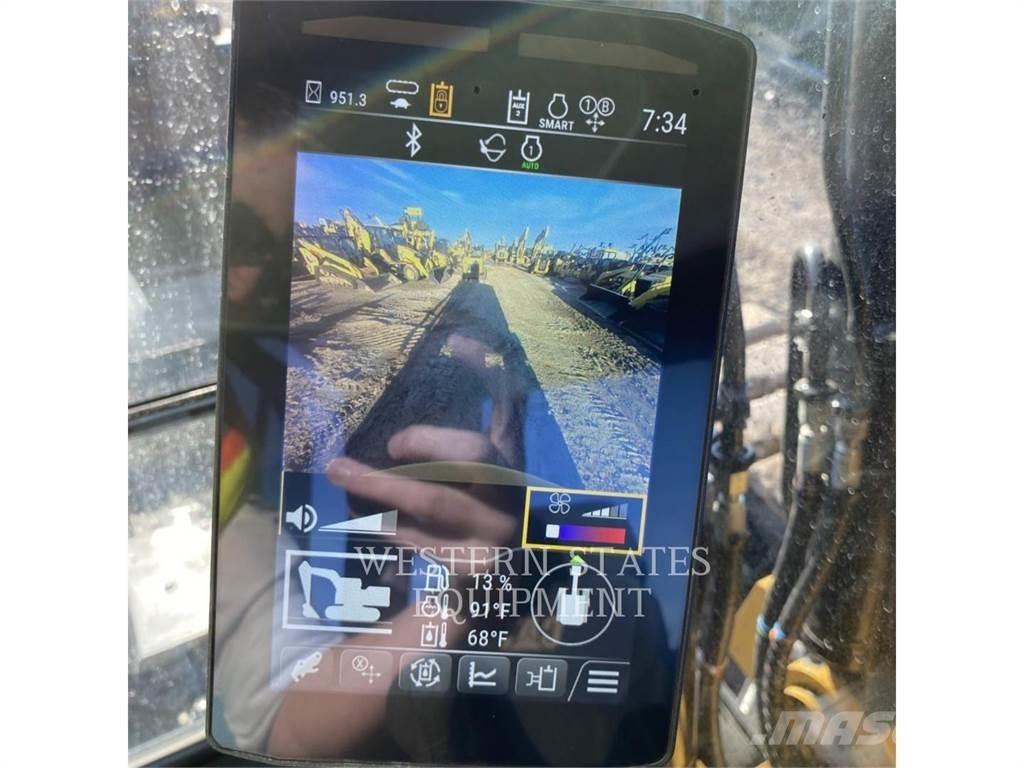 CAT 310 Pásová rýpadla