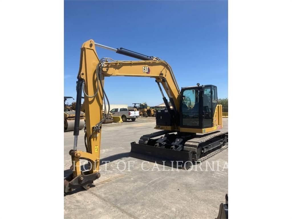 CAT 310 Pásová rýpadla