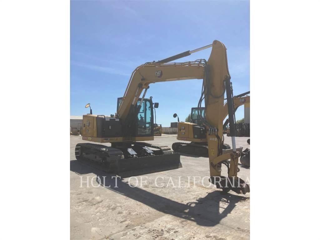 CAT 310 Pásová rýpadla