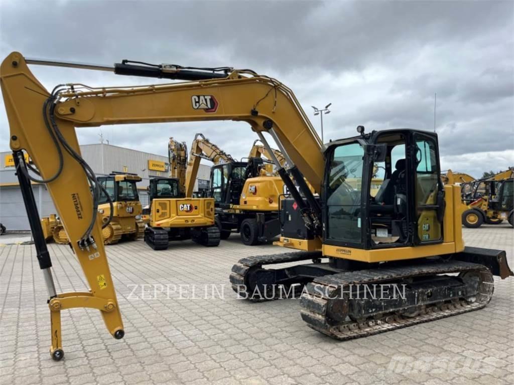 CAT 310 Pásová rýpadla