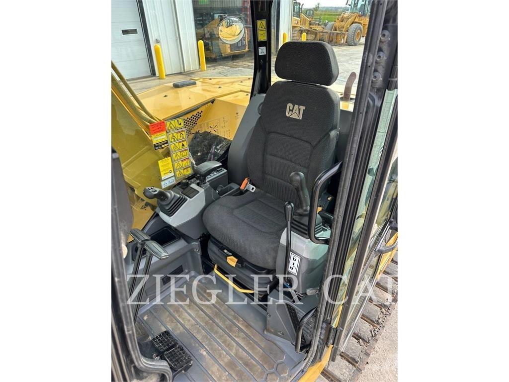 CAT 310 Pásová rýpadla