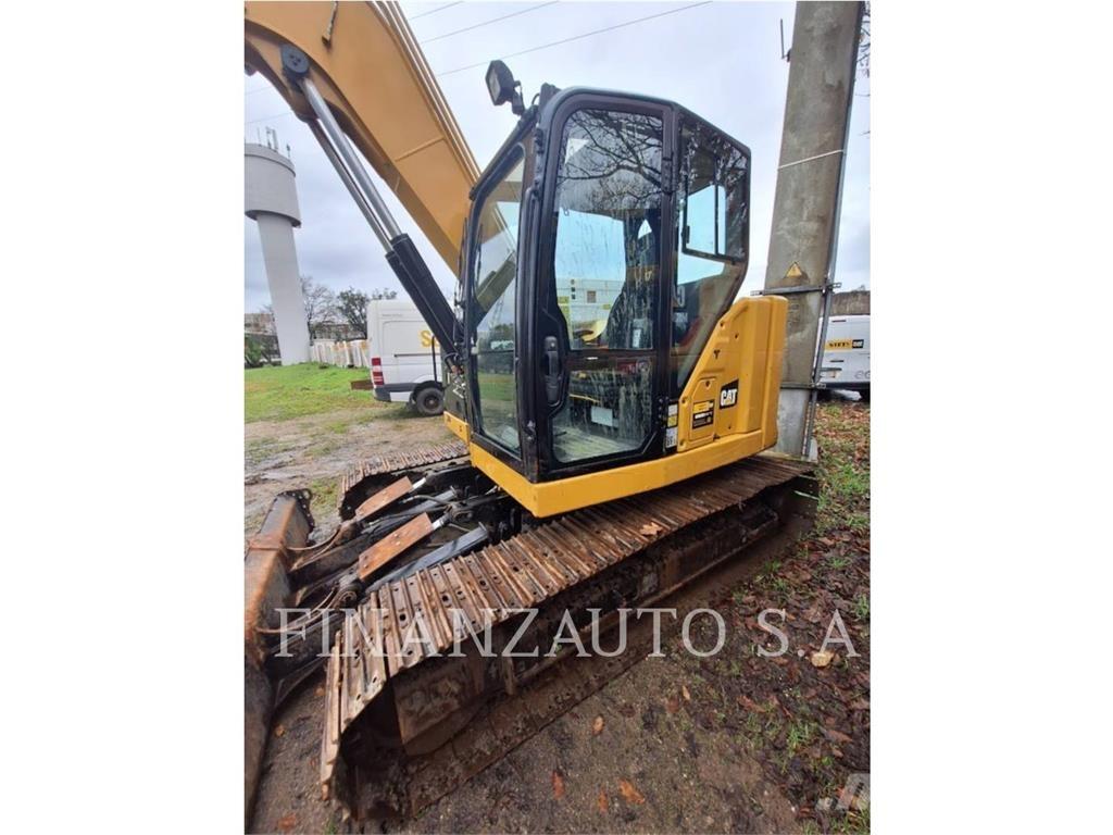 CAT 310 Pásová rýpadla