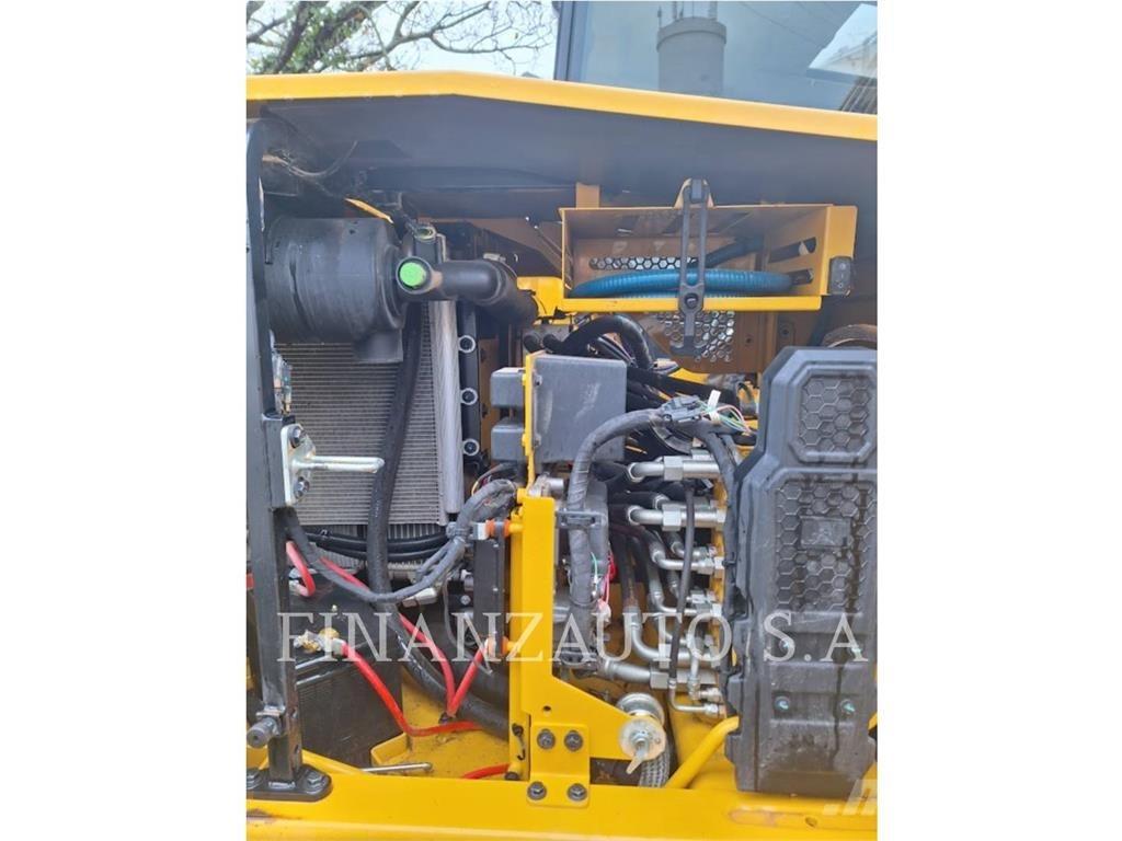 CAT 310 Pásová rýpadla