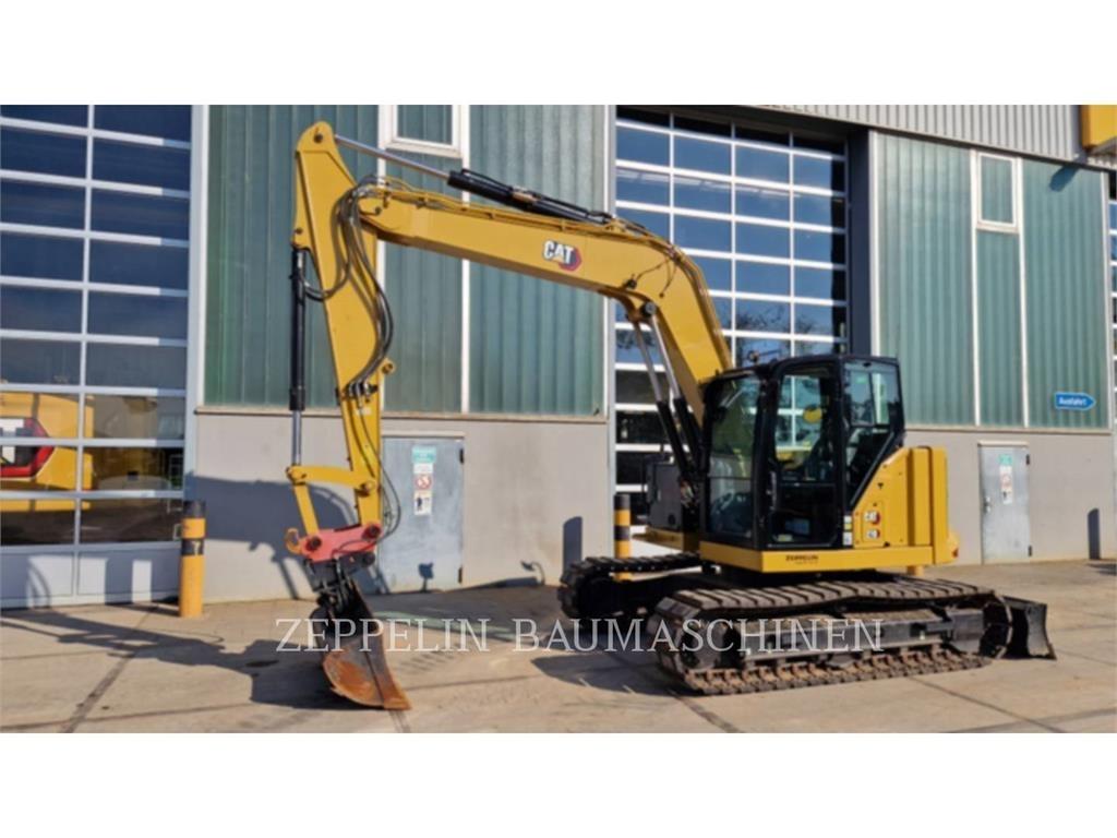 CAT 310 Pásová rýpadla