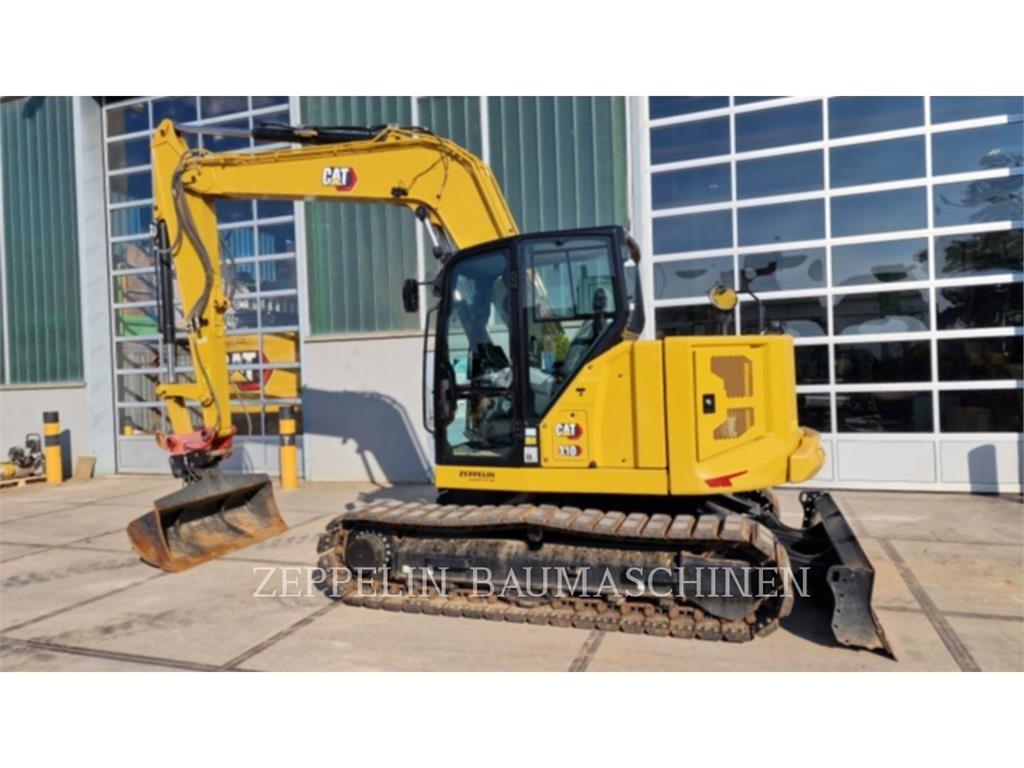 CAT 310 Pásová rýpadla