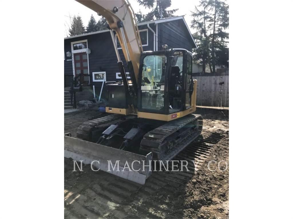 CAT 310 Pásová rýpadla