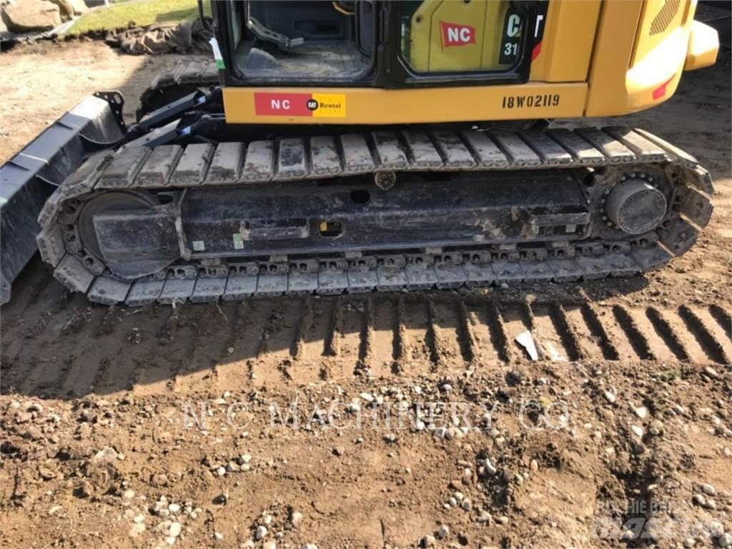 CAT 310 Pásová rýpadla