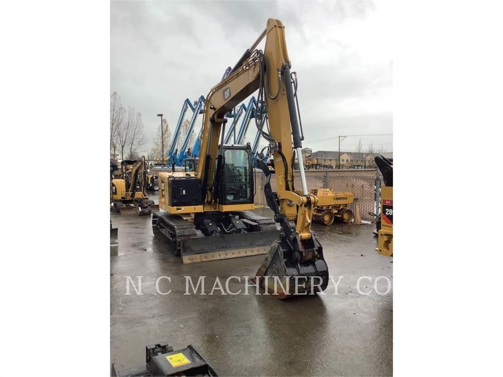 CAT 310 Pásová rýpadla
