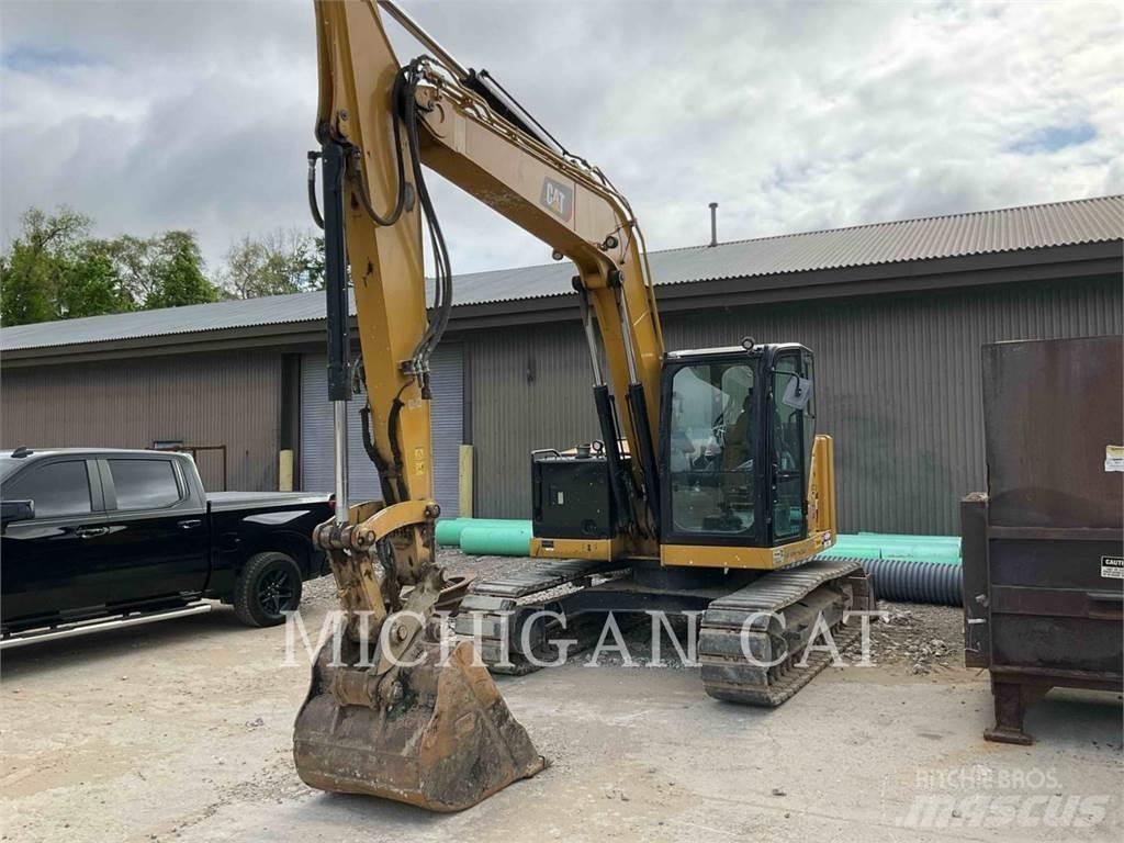 CAT 310 AQ Pásová rýpadla