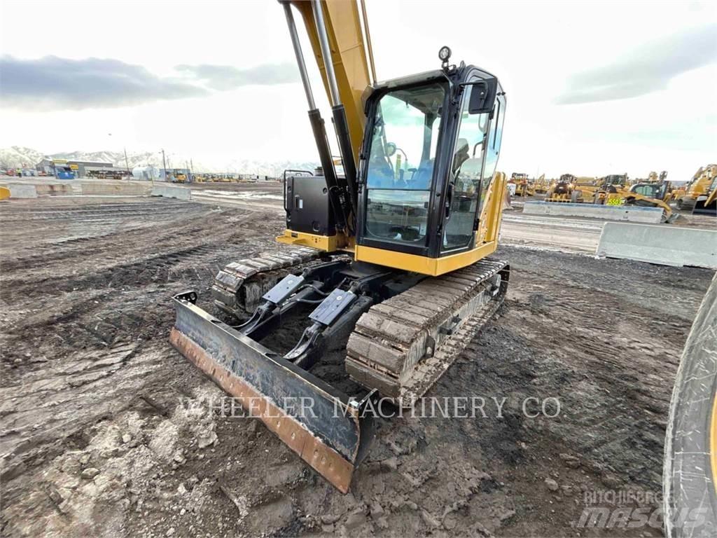 CAT 310 CF Pásová rýpadla