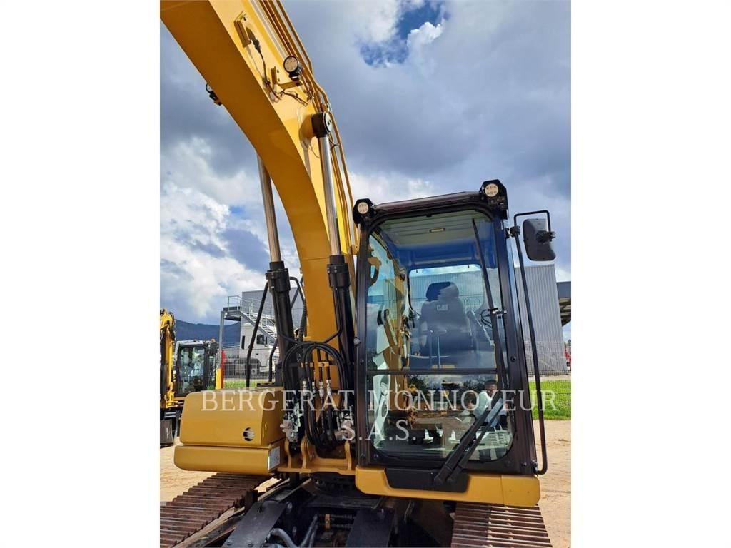 CAT 313 Pásová rýpadla