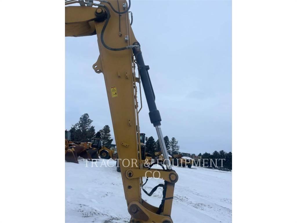 CAT 313 Pásová rýpadla