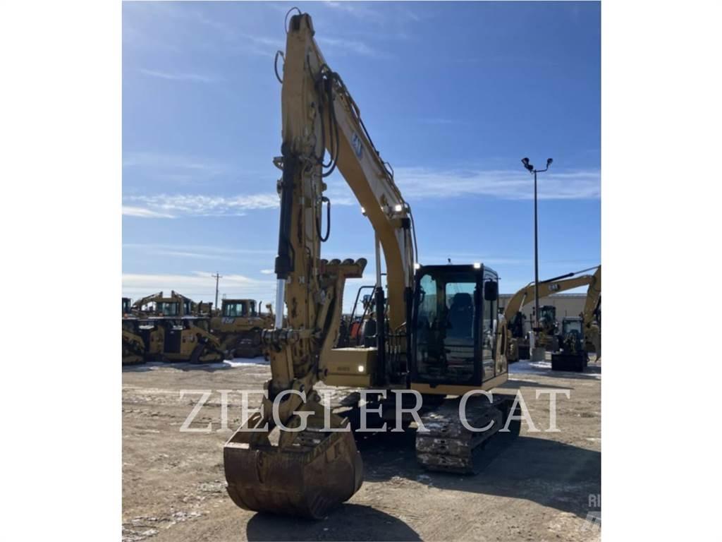 CAT 313 Pásová rýpadla