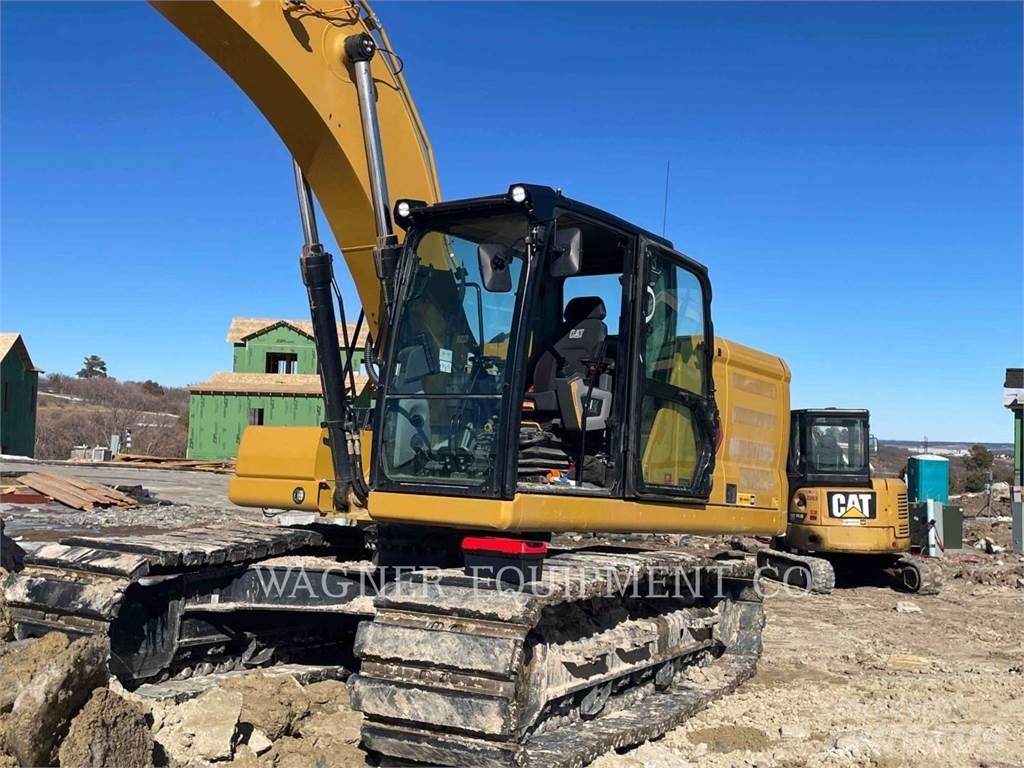 CAT 323 Pásová rýpadla