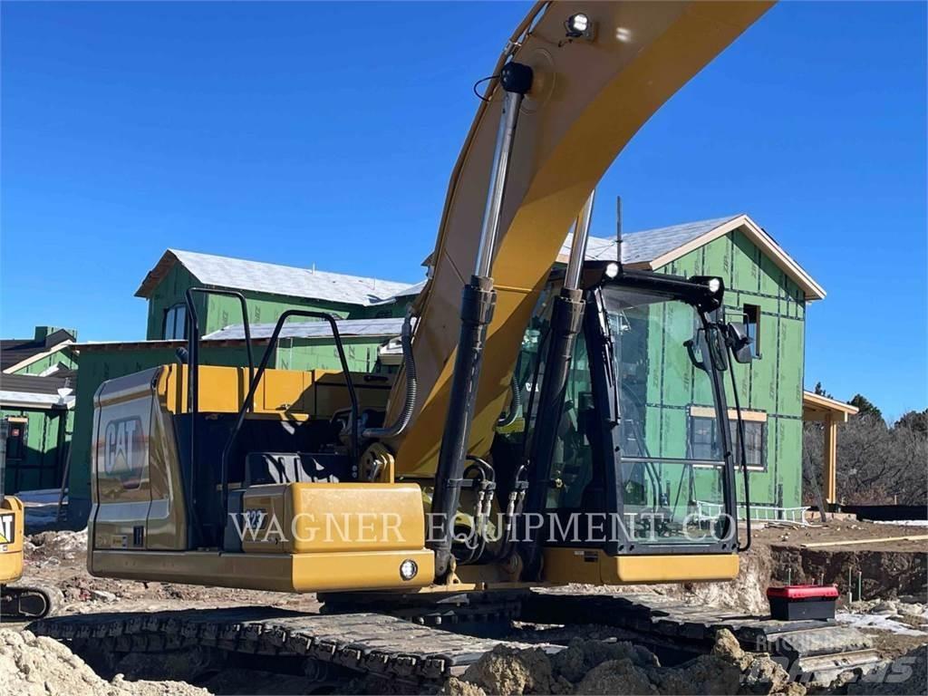 CAT 323 Pásová rýpadla