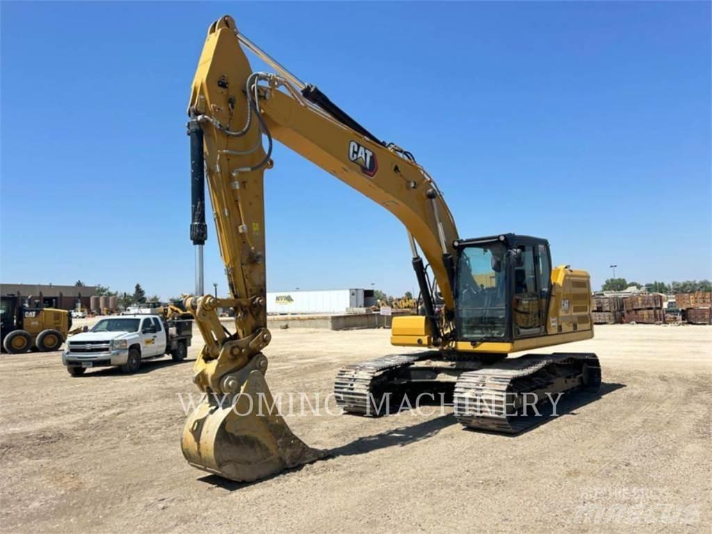 CAT 323 Pásová rýpadla