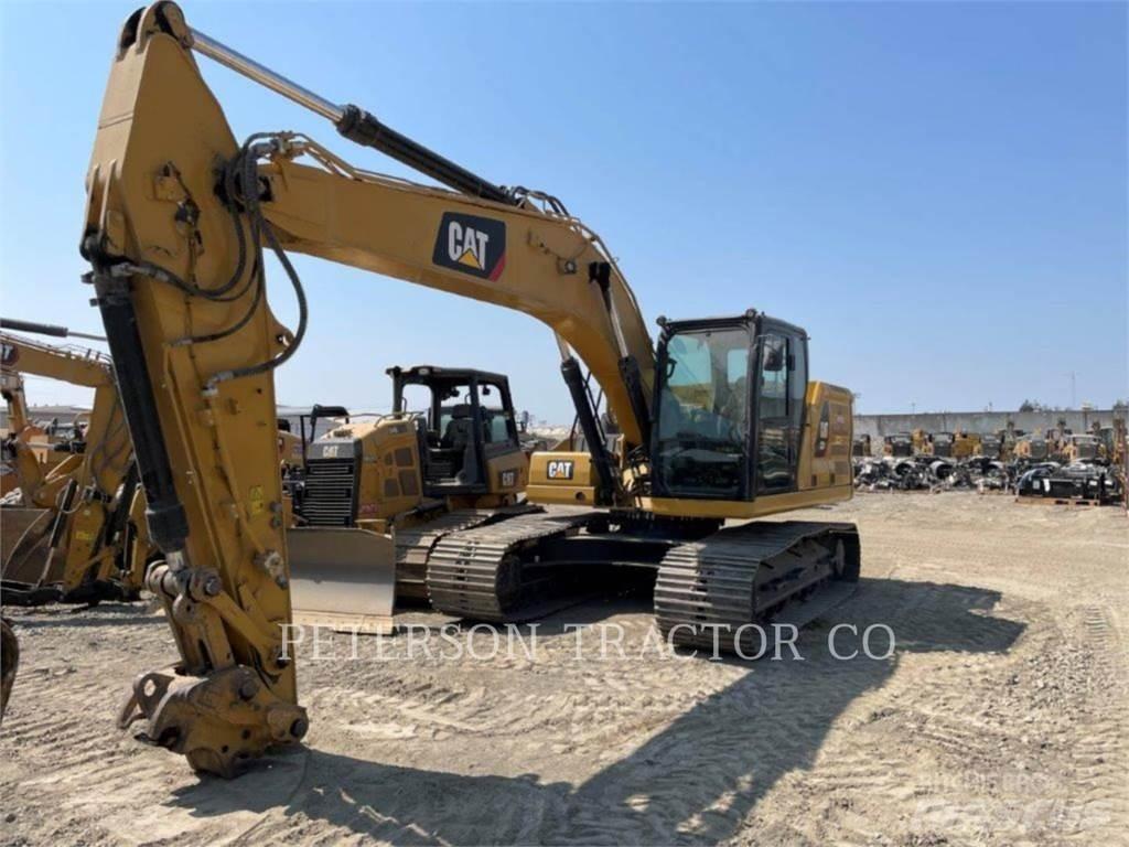 CAT 323 Pásová rýpadla