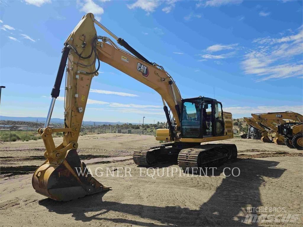 CAT 323 Pásová rýpadla