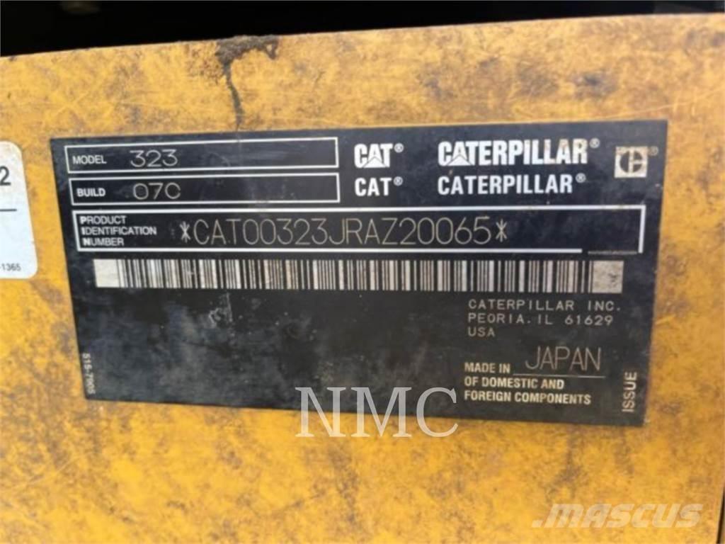 CAT 323 Pásová rýpadla
