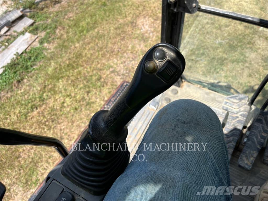 CAT 323 Pásová rýpadla