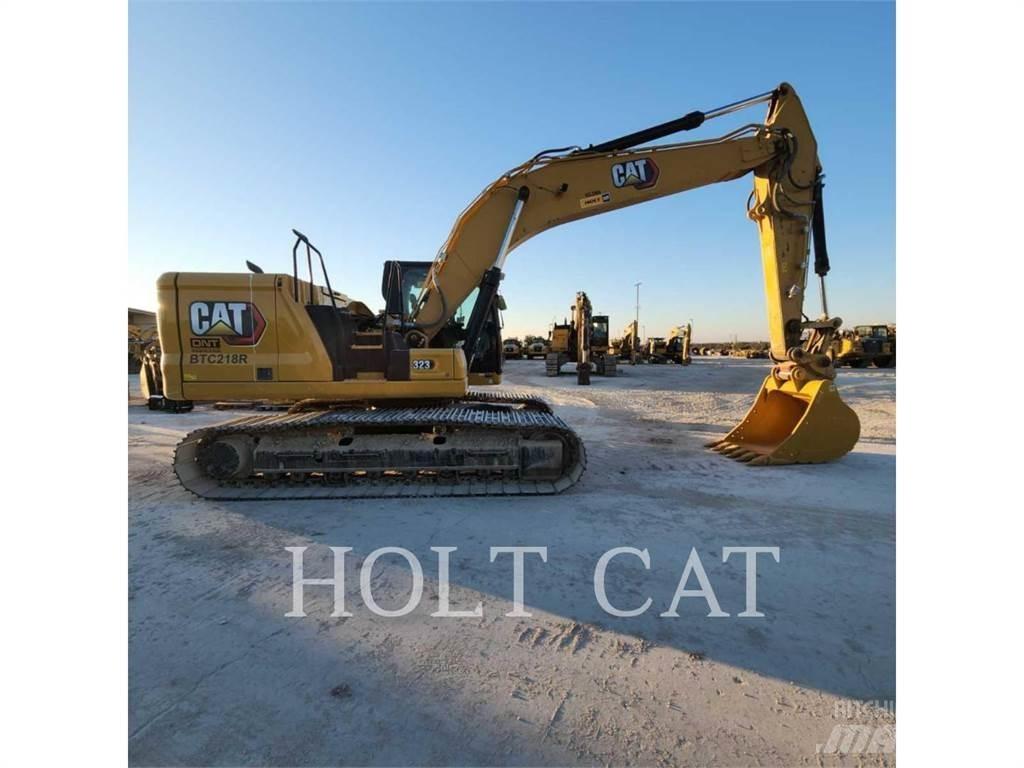 CAT 323 TC Pásová rýpadla