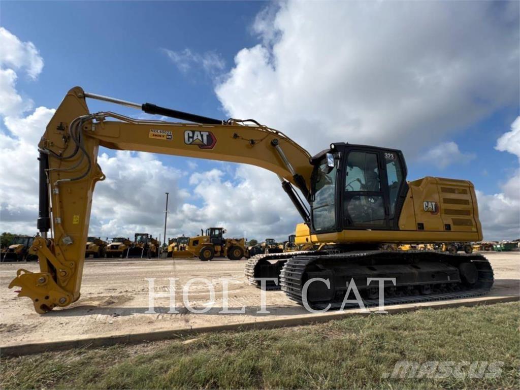 CAT 323 TC Kolové nakladače
