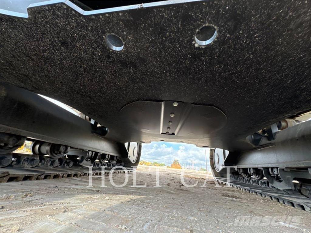 CAT 323 TC Kolové nakladače