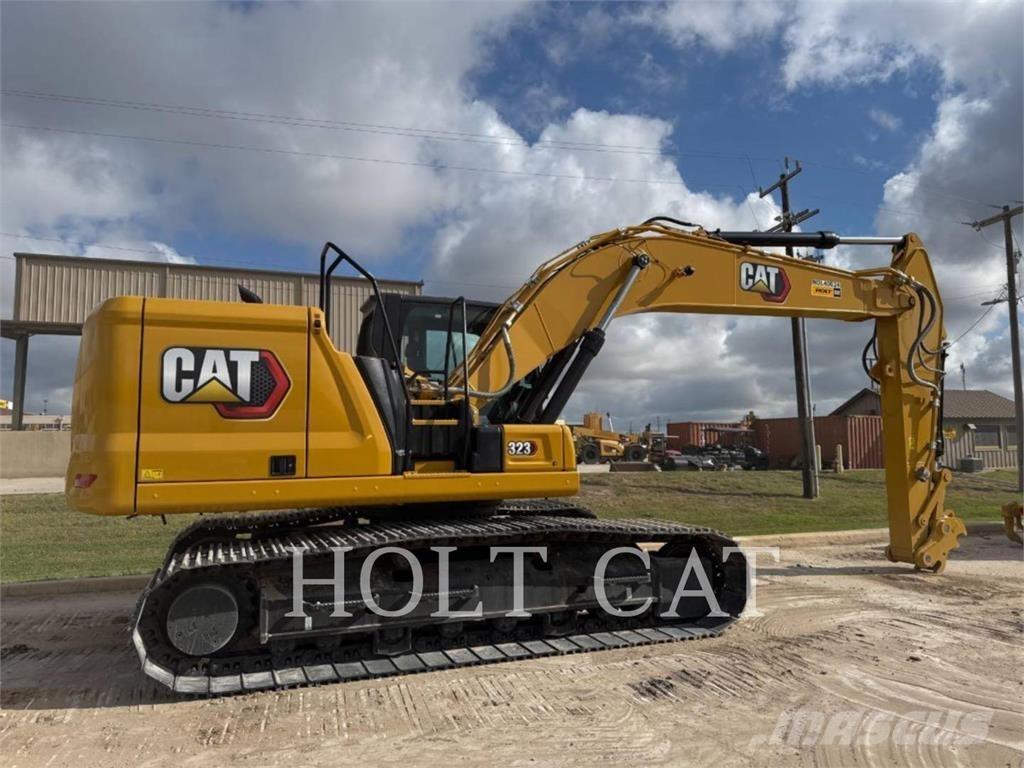 CAT 323 TC Kolové nakladače
