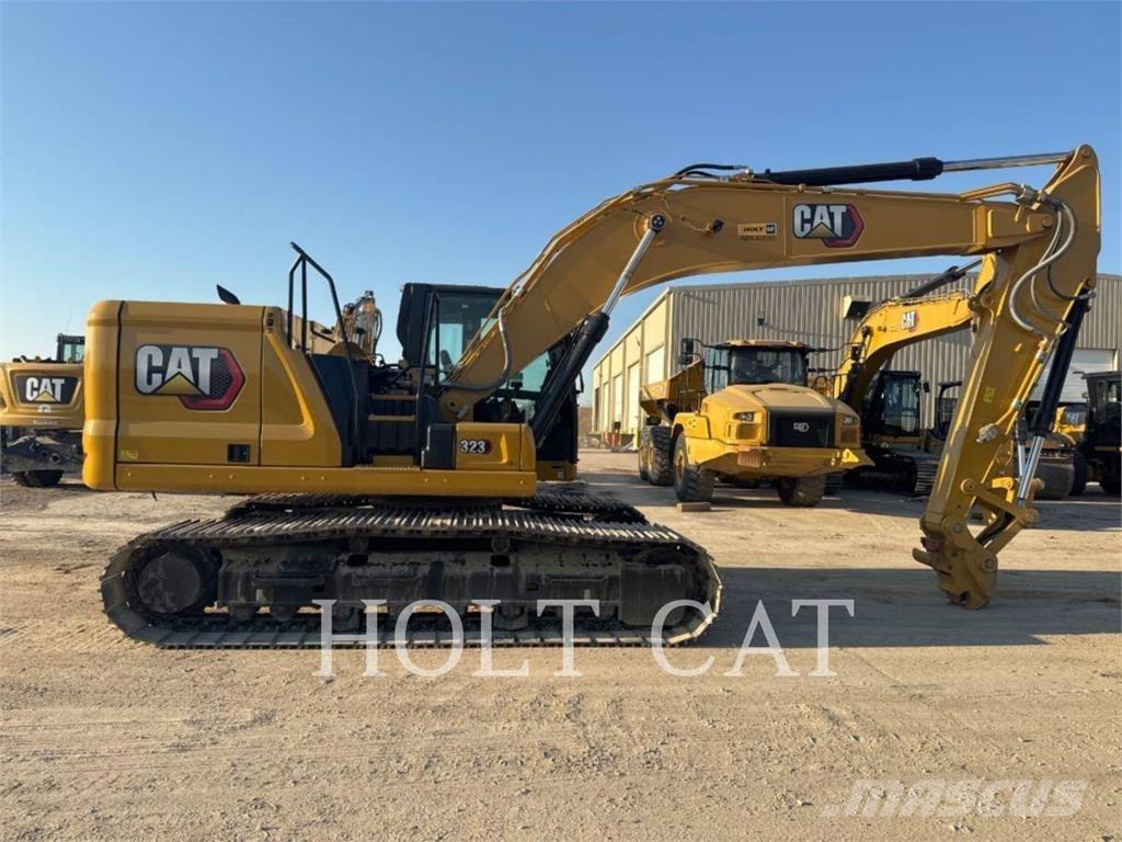 CAT 323 TC Kolové nakladače