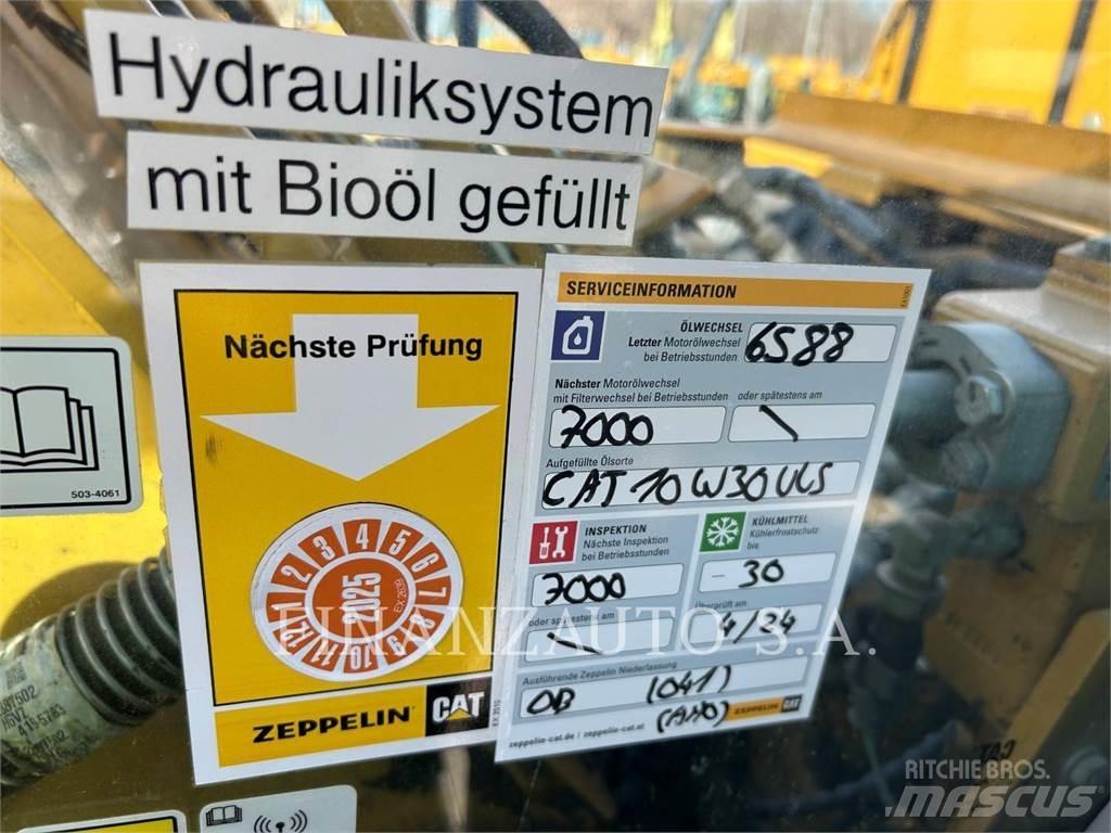 CAT 323E Pásová rýpadla