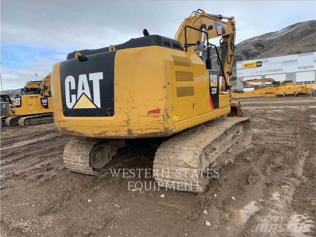 CAT 323F Pásová rýpadla