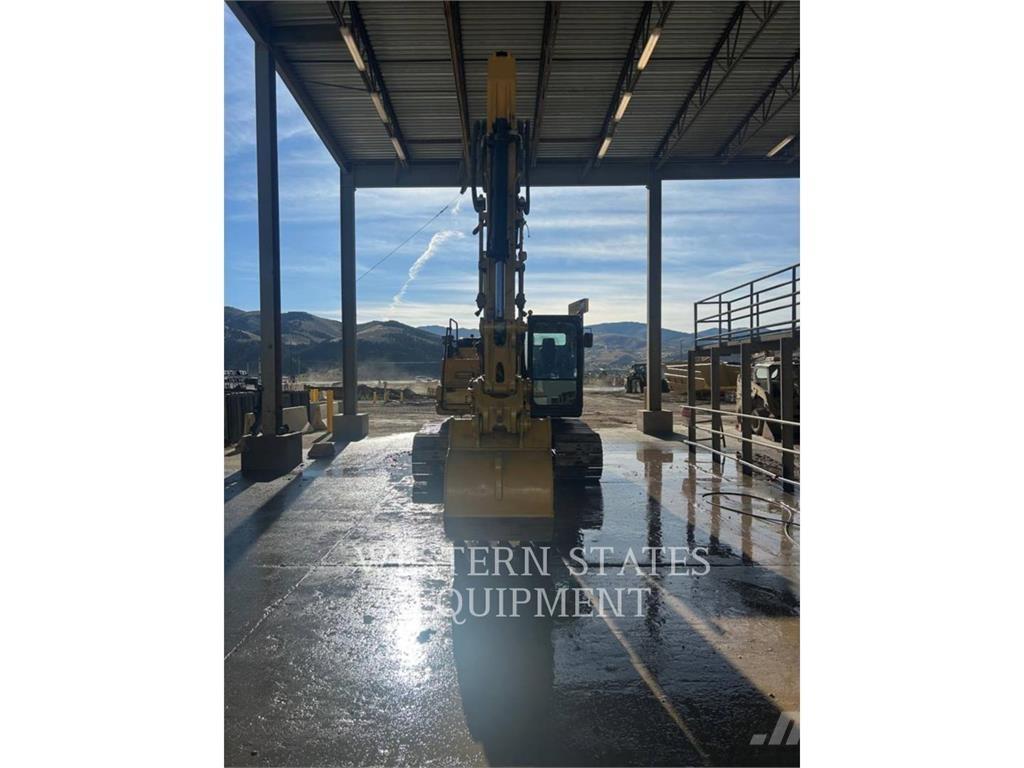 CAT 323F Pásová rýpadla