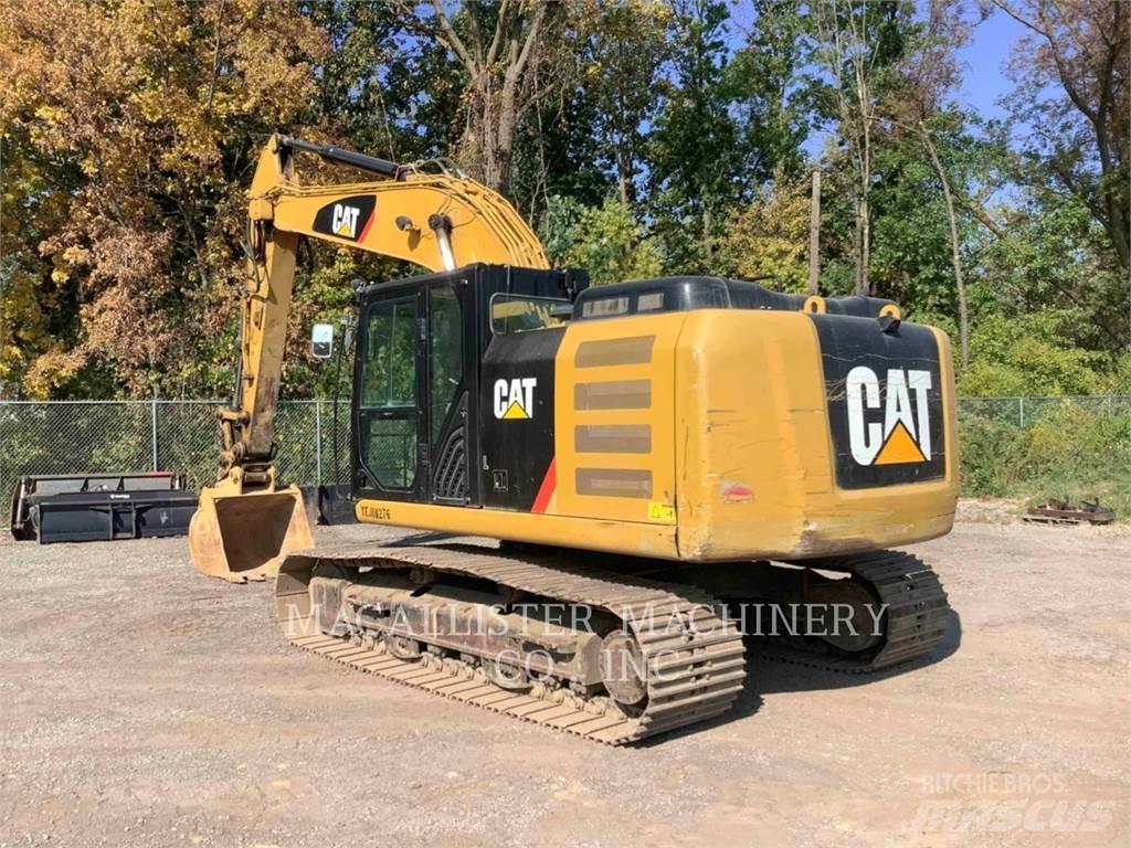 CAT 323FL Pásová rýpadla