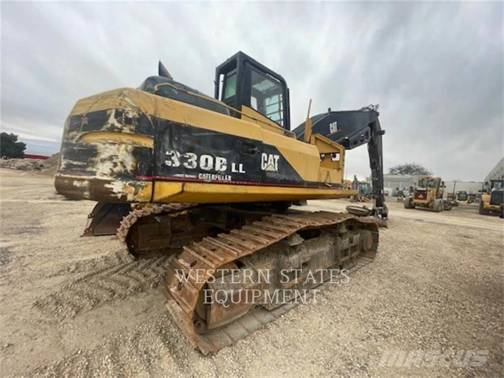 CAT 330B FM Lesní traktory