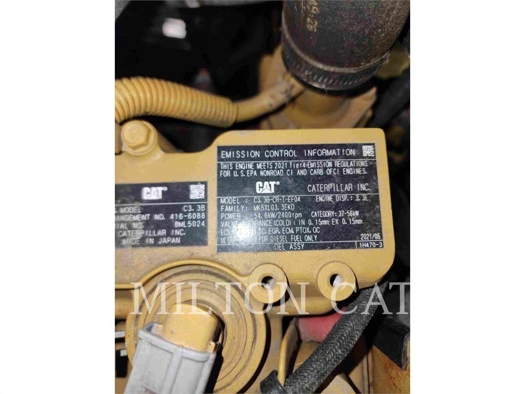 CAT 906M Kolové nakladače