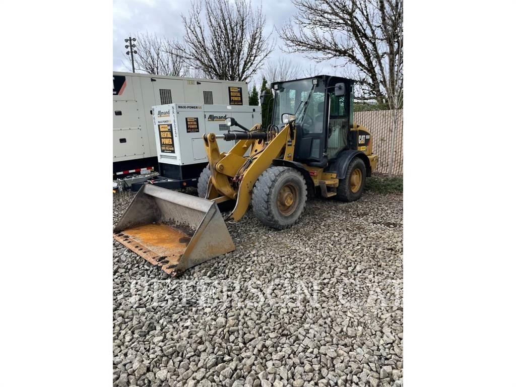 CAT 906M Kolové nakladače