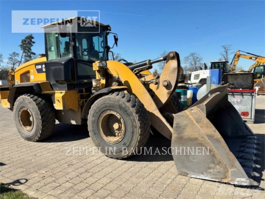 CAT 938M Kolové nakladače