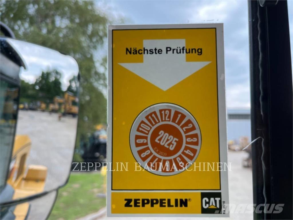 CAT 938M Kolové nakladače