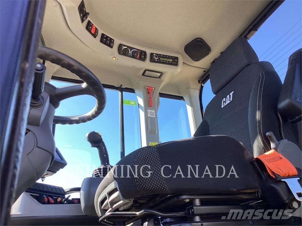 CAT 938M Kolové nakladače